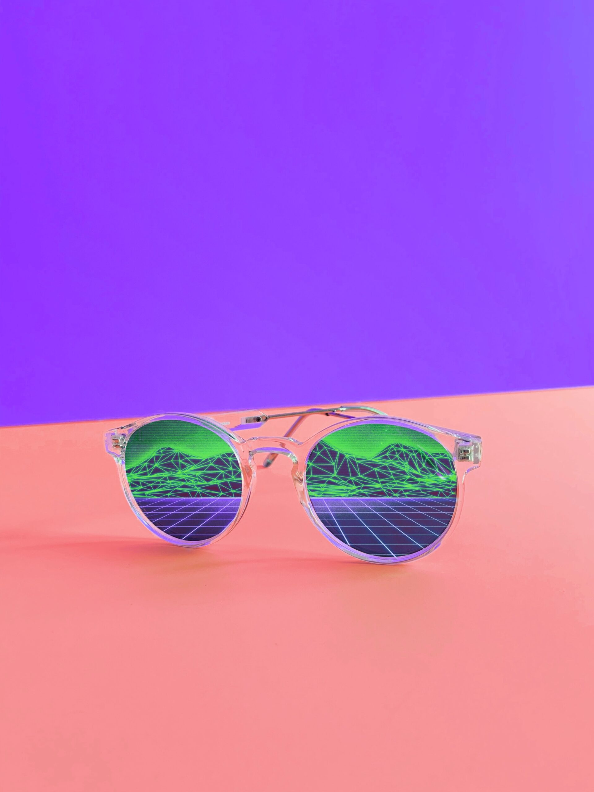 Sunglasses with a 3D reflection on a pink and purple background